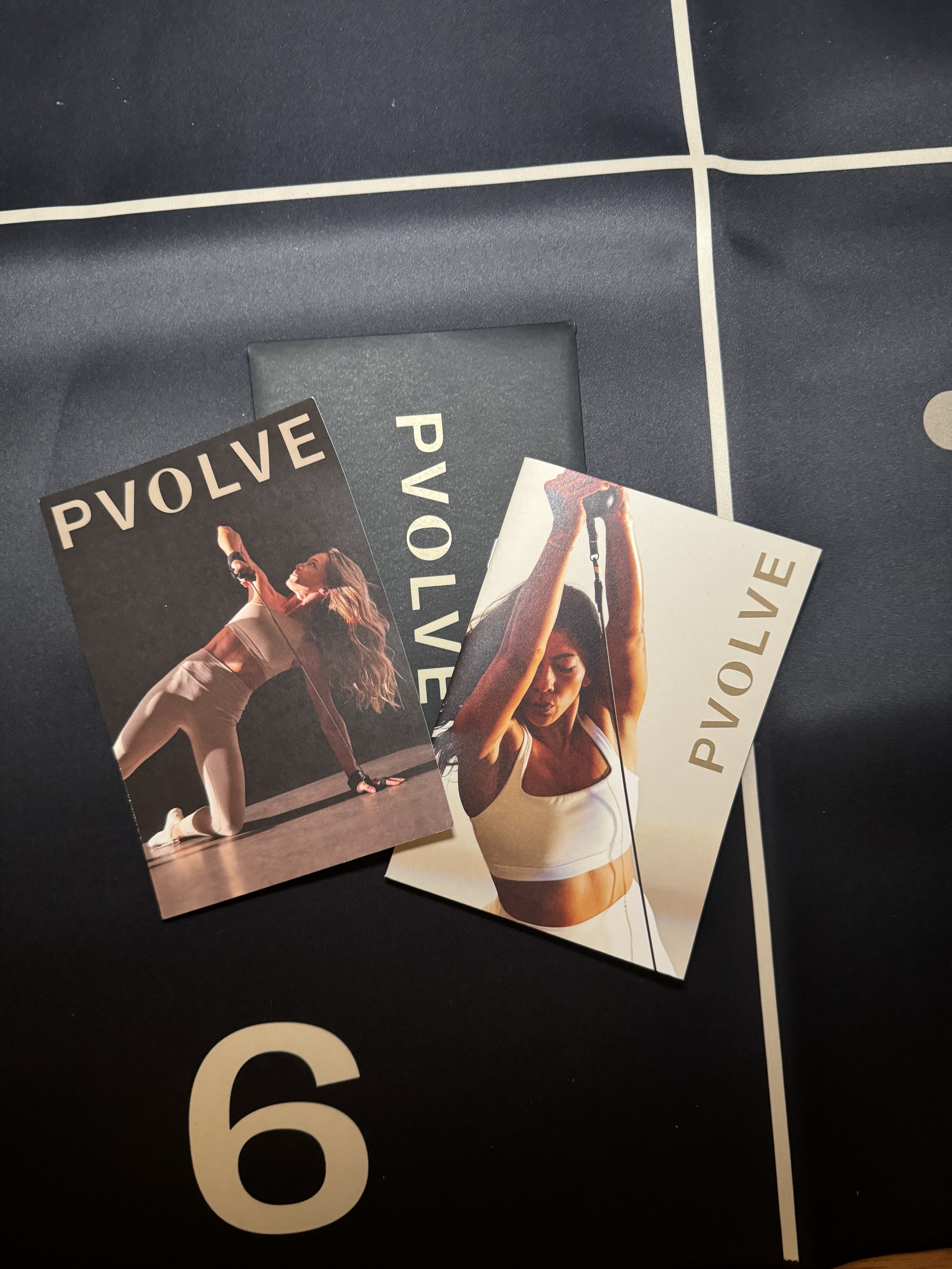 Pvolve pamphlets on a mat