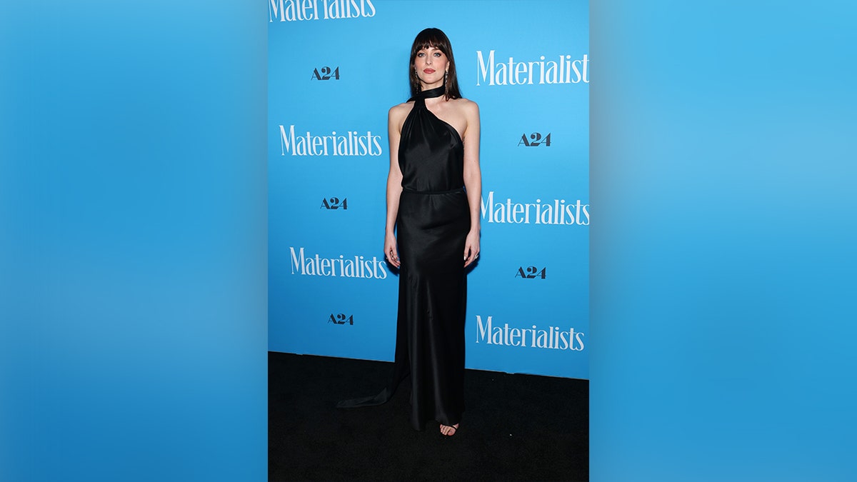 Dakota Johnson at the premiere of "The Materialists" in black.