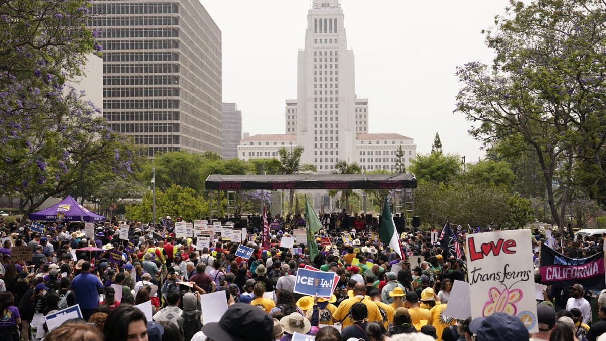 People attend a rally