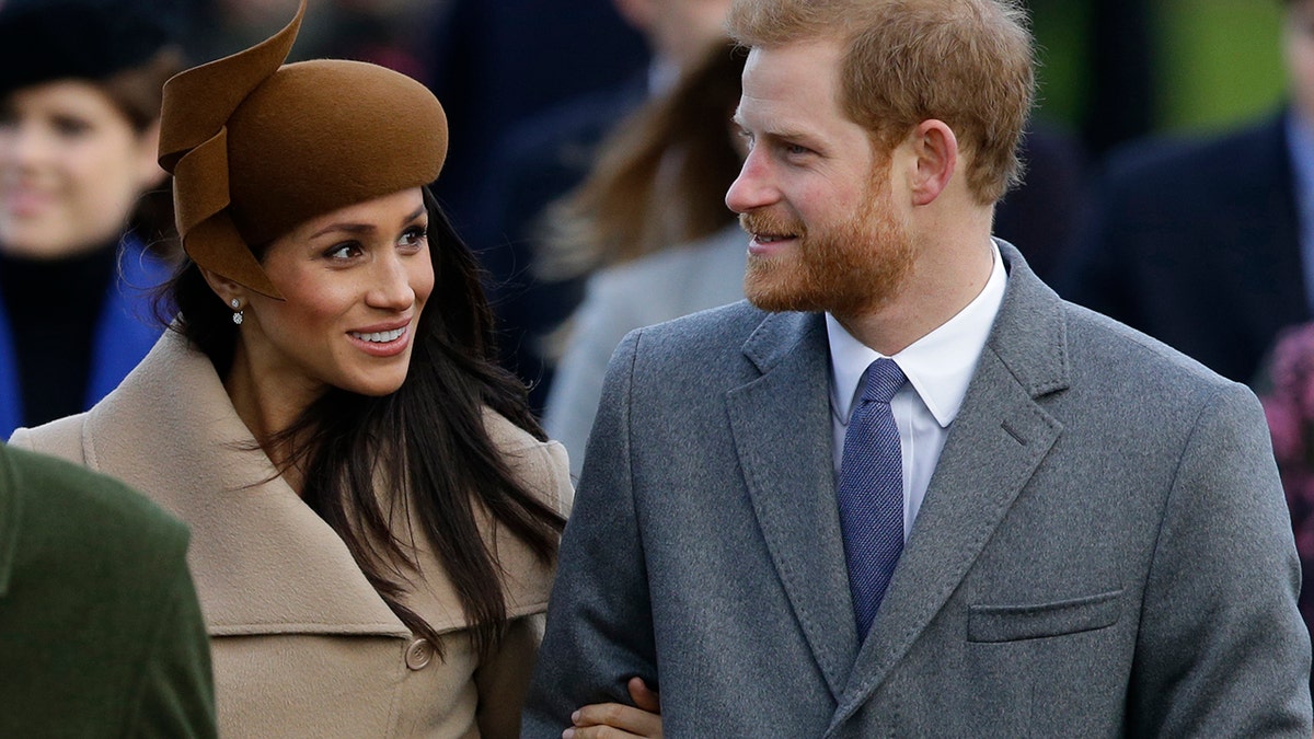Prince Harry and his fiancee Meghan Markle arrive to attend the traditional Christmas Day service, at St. Mary Magdalene Church in Sandringham, England, Monday, Dec. 25, 2017. (AP Photo/Alastair Grant)