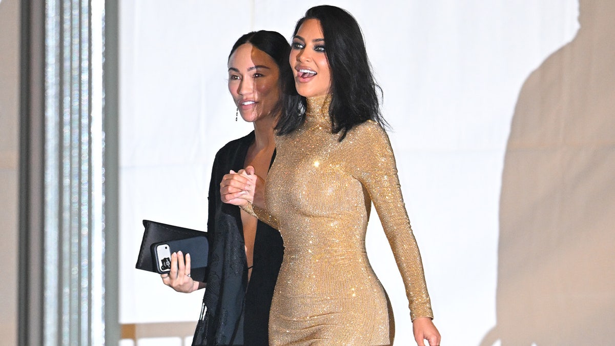 Kim Kardashian walking with Stephanie Shepherd 