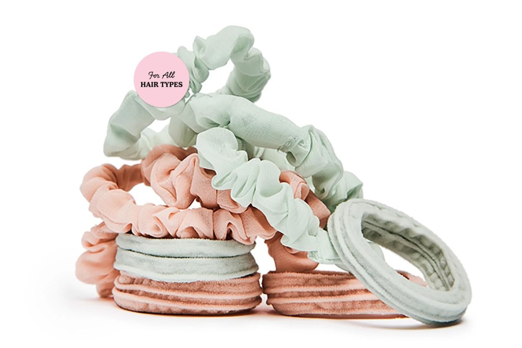 A pile of pastel pink and light green scrunchies, with a pink circle in the upper left that reads "For All HAIR TYPES."