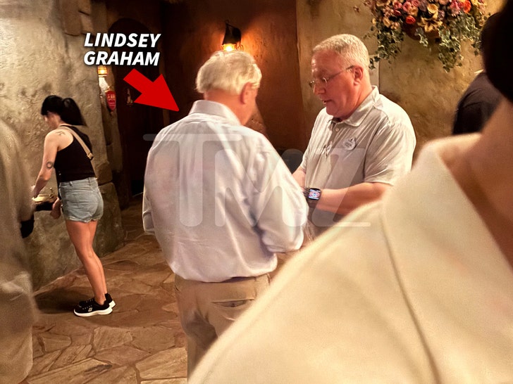 lindsey graham at disney world holding toy tmz 3