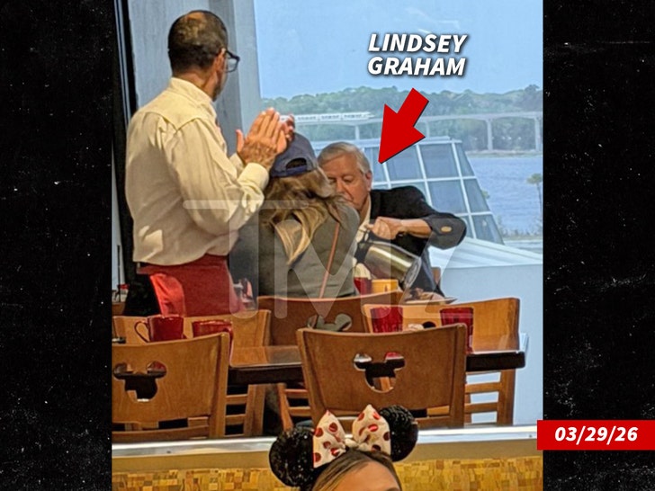 lindsey graham at disney world chef mickey restaurant handout tmz 6