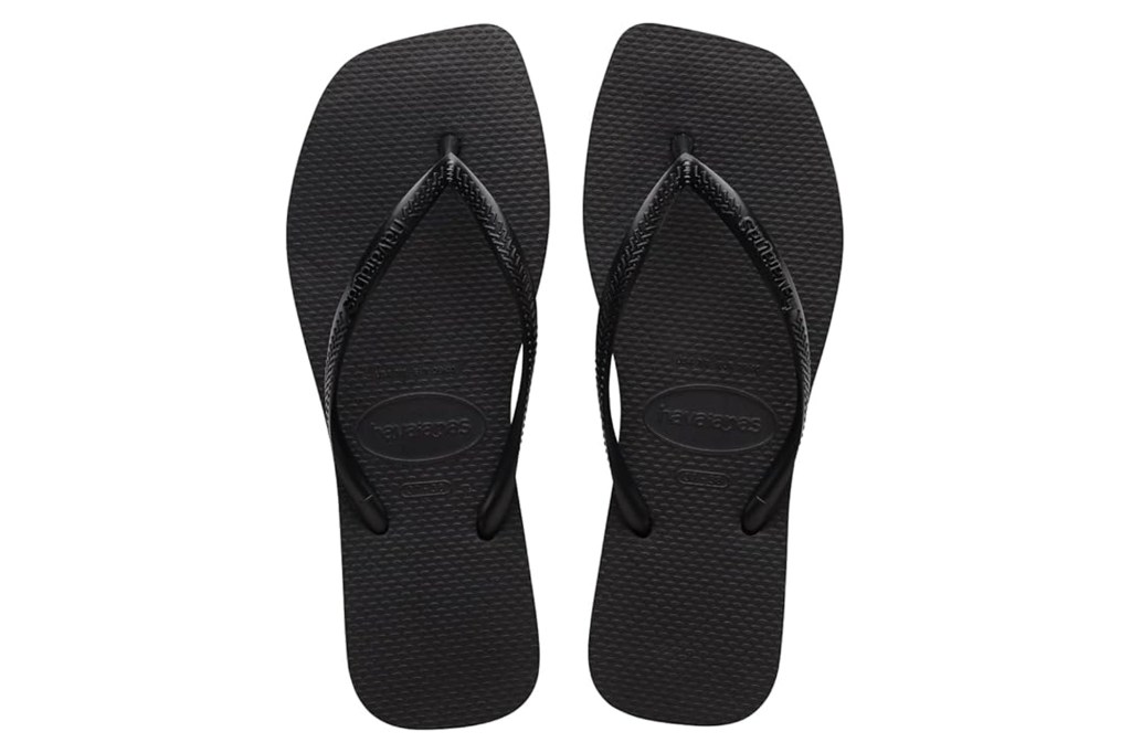 A pair of black Havaianas flip-flops.