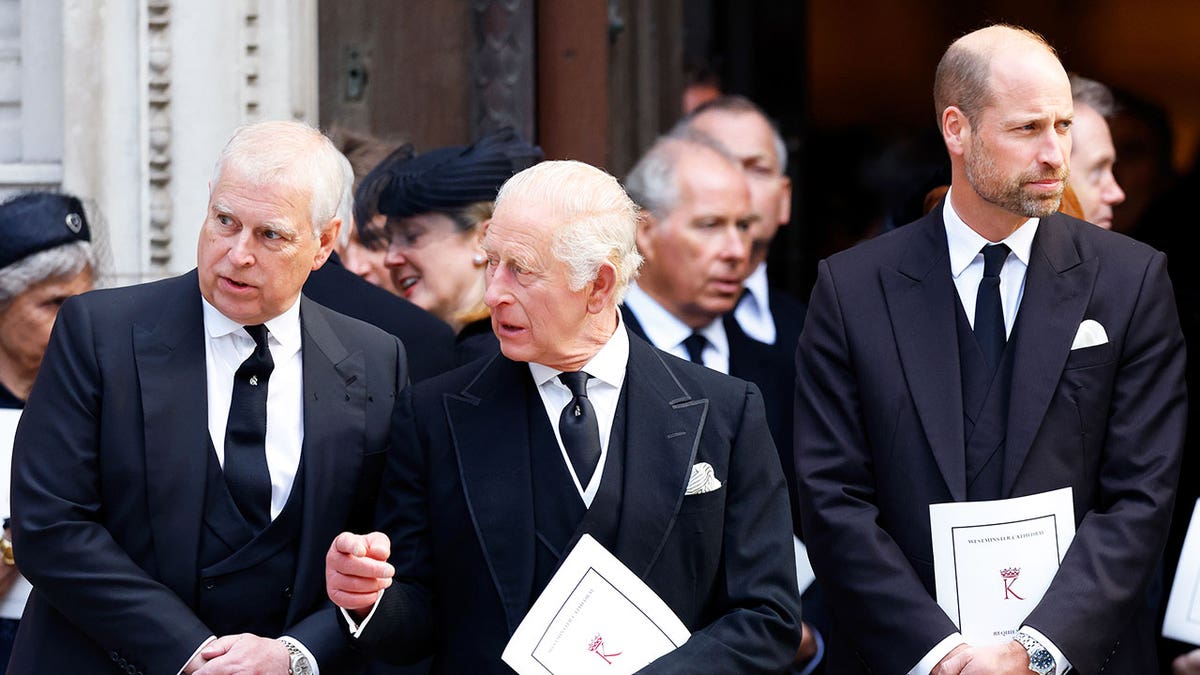 King Charles and Andrew Mountbatten-Windsor having an conversation while Prince William looks away.
