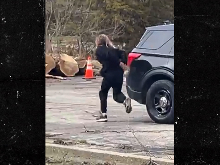 033126 woman cop car sub1