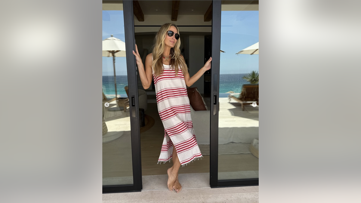 Molly SIms in a beach cover up