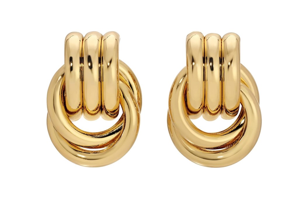 Pair of gold hoop earrings with three stacked rings.