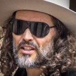 Russell Brand's rape trial delayed for six months