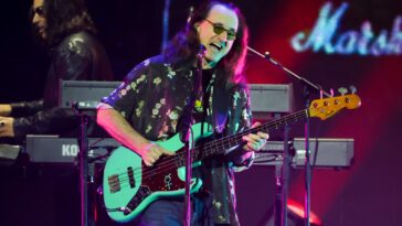 Watch Rush play live with new drummer Anika Nilles for the first time in surprise awards show performance