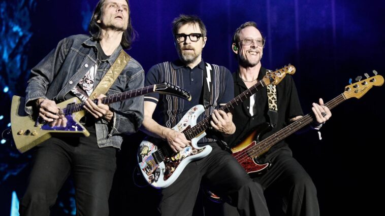 Watch Weezer play a surprise rooftop gig for their 'The Gathering' tour "initiation week"