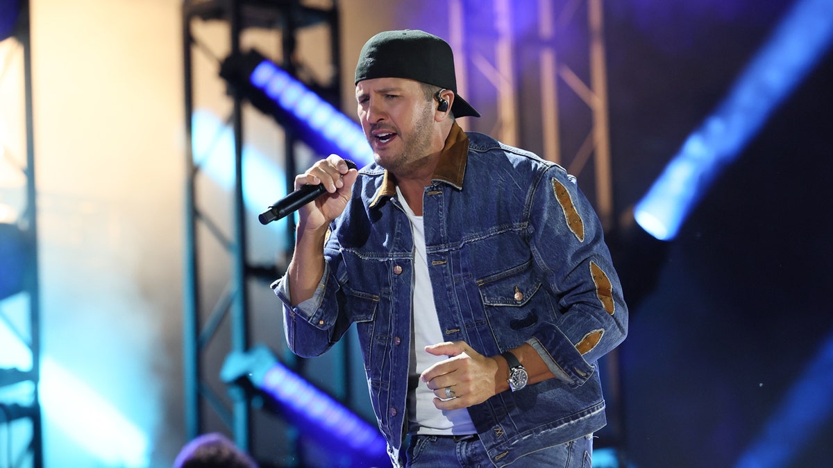 Luke Bryan performs on stage at CMA Fest