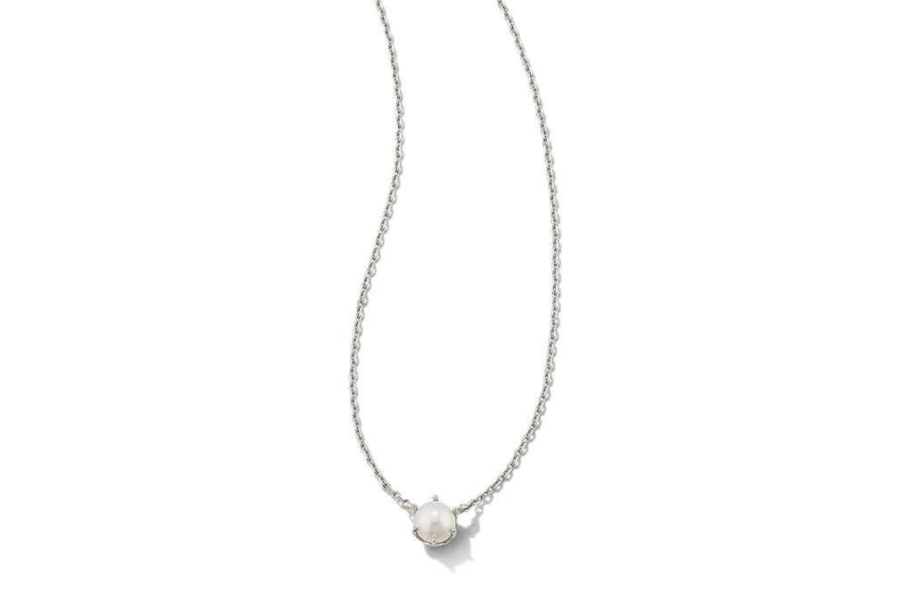 Silver chain necklace with a pearl pendant.