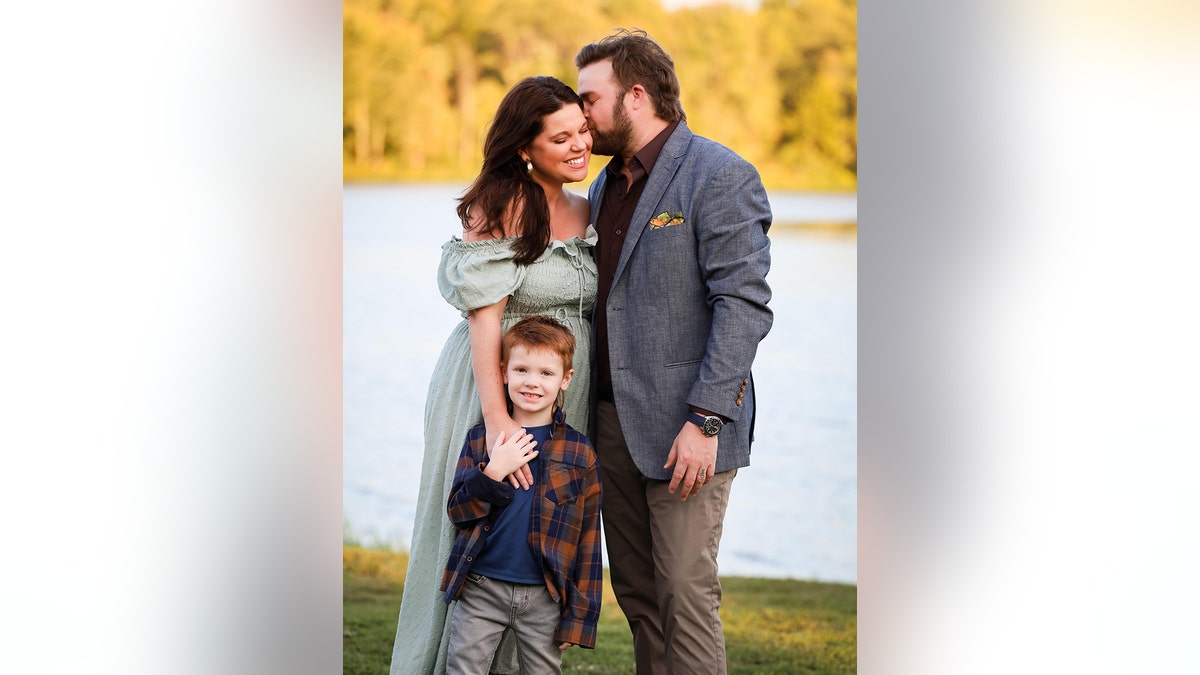 Amy Duggar King family portrait.