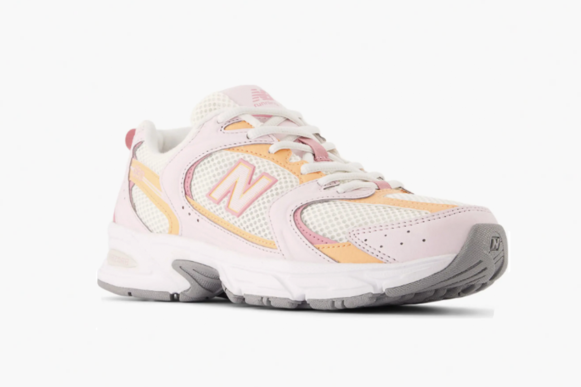 New Balance 530 women's shoe in white, pink, and orange.