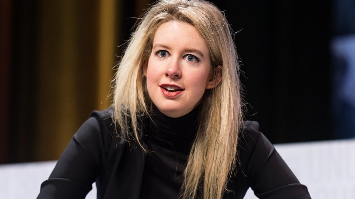 Elizabeth Holmes wears black turtleneck