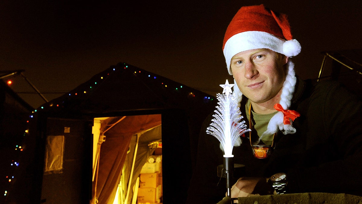 Prince Harry wearing a Santa hat in Afghanistan.