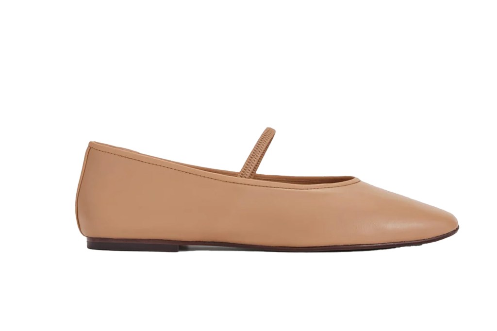 A single tan Mary Jane style flat shoe with a braided strap over the arch.