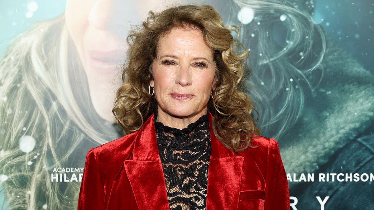 Nancy Travis standing at the Ordinary Angels premiere in New York City