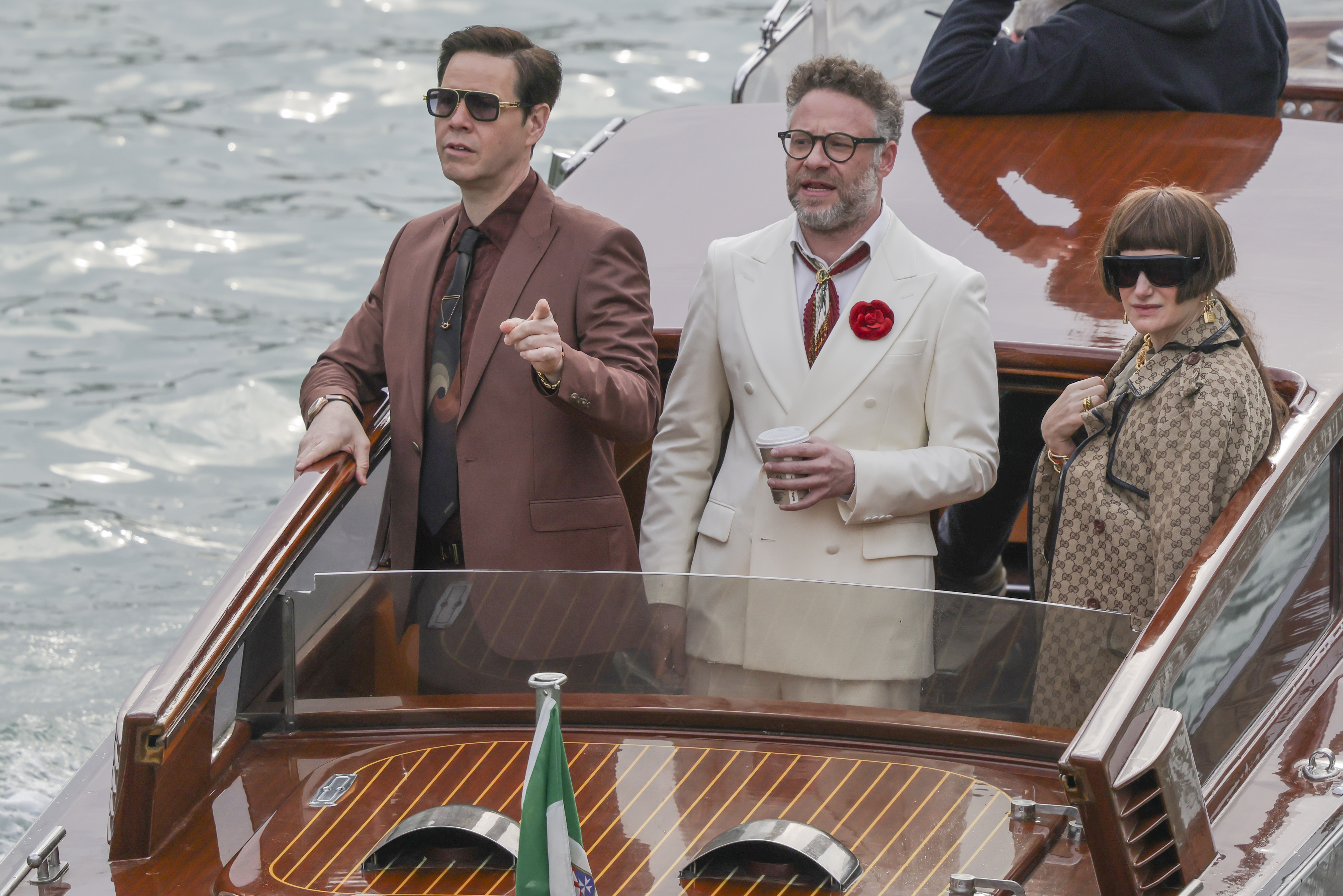  “The Studio” stars Ike Barinholtz (from left), Seth Rogen and Kathryn Hahn shoot their Apple TV show in Venice, Italy.