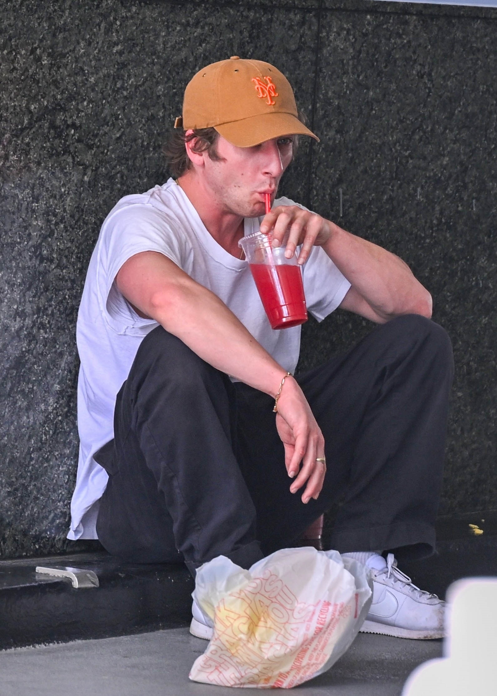 Jeremy Allen White makes a rest stop  at LA’s Studio City Farmers Market for some lunch.