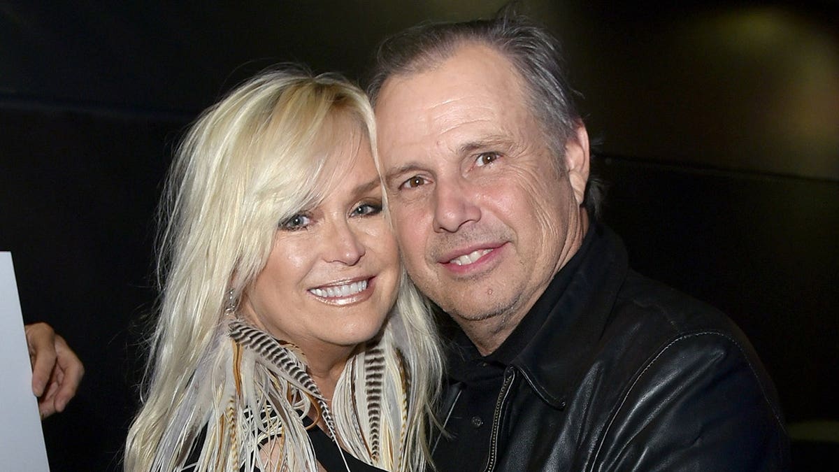 Actor Catherine Hickland and husband Todd Fisher celebrating at TCL Chinese 6 Theatres in Hollywood