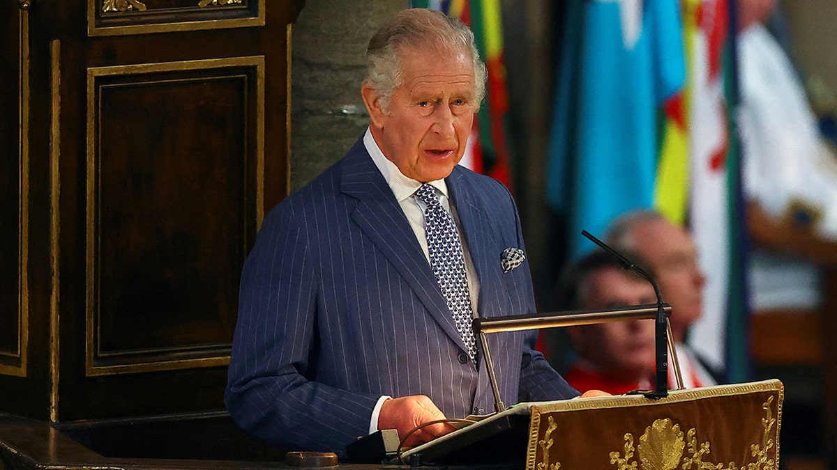 King Charles III delivering a speech at Westminster Abbey in London