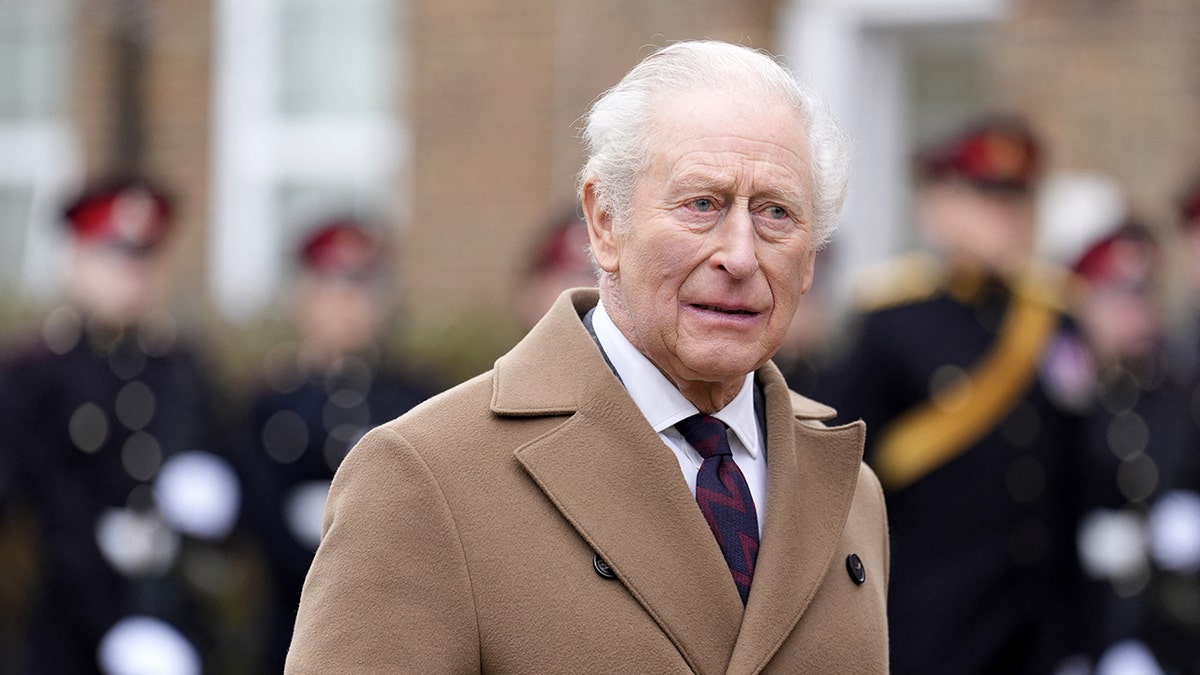 King Charles III standing in military uniform at Baker Barracks in Emsworth