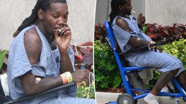 Offset smokes cigarette outside hospital after being shot in the leg