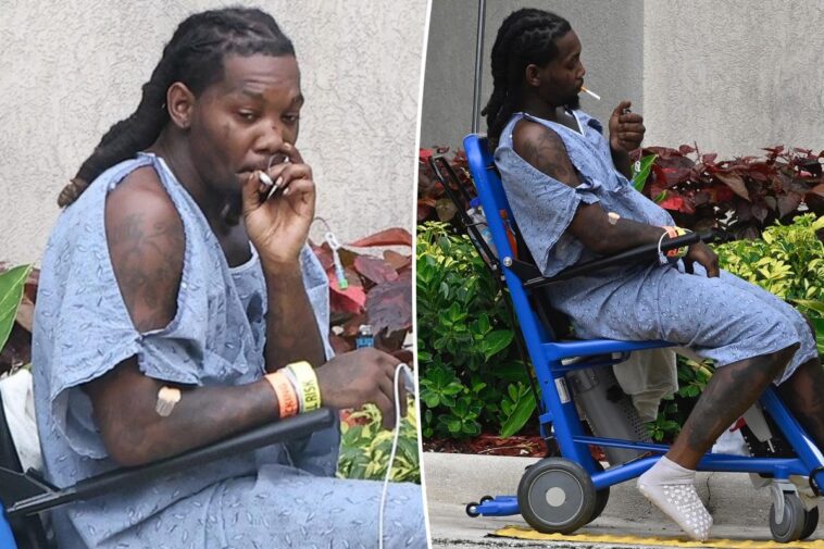 Offset smokes cigarette outside hospital after being shot in the leg