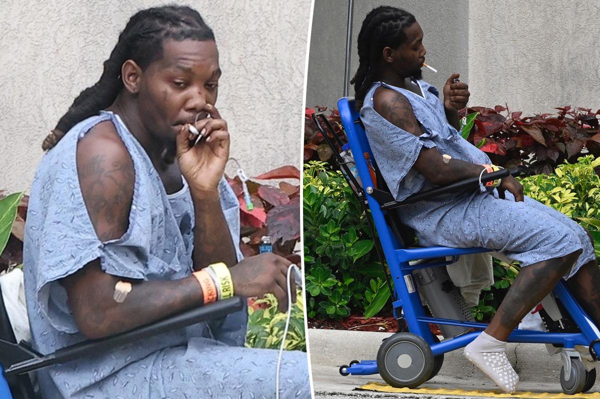 Offset smokes cigarette outside hospital after being shot in the leg