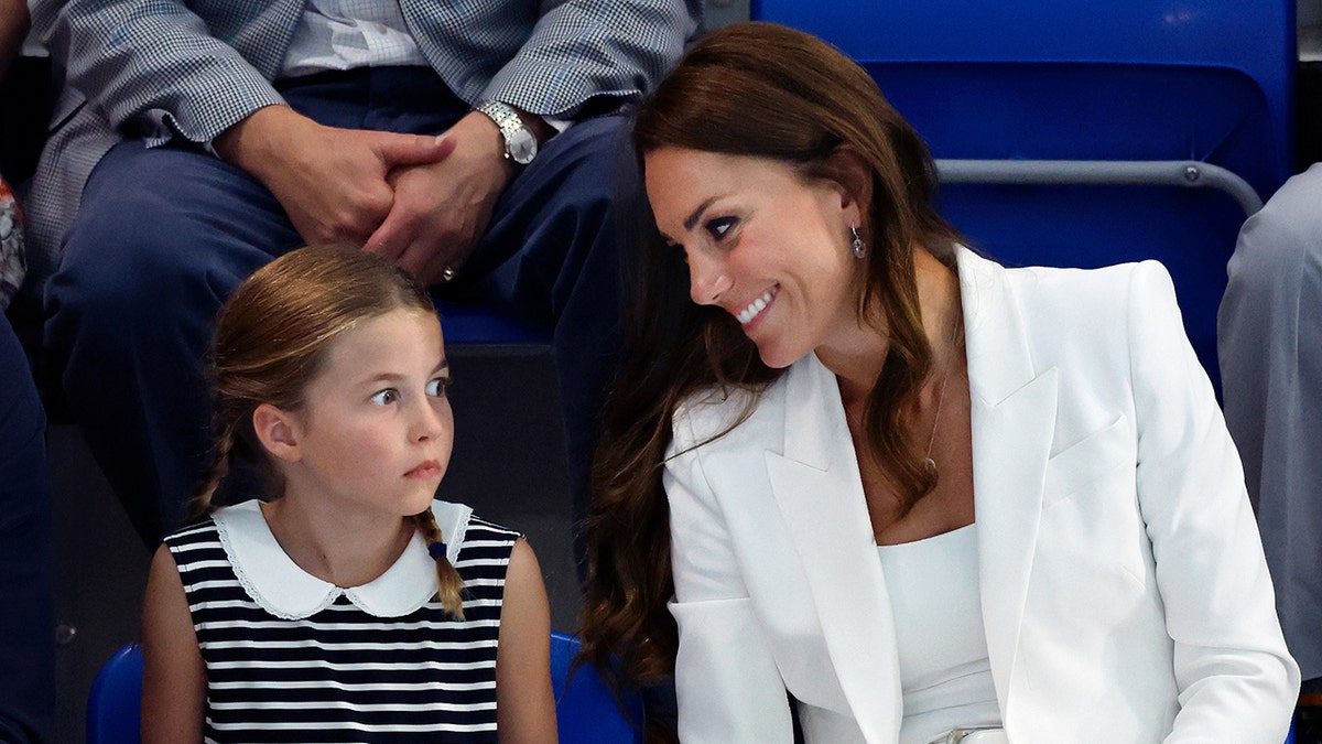 Princess Charlotte and Catherine Duchess of Cambridge watching swimming competition at Sandwell Aquatics Centre