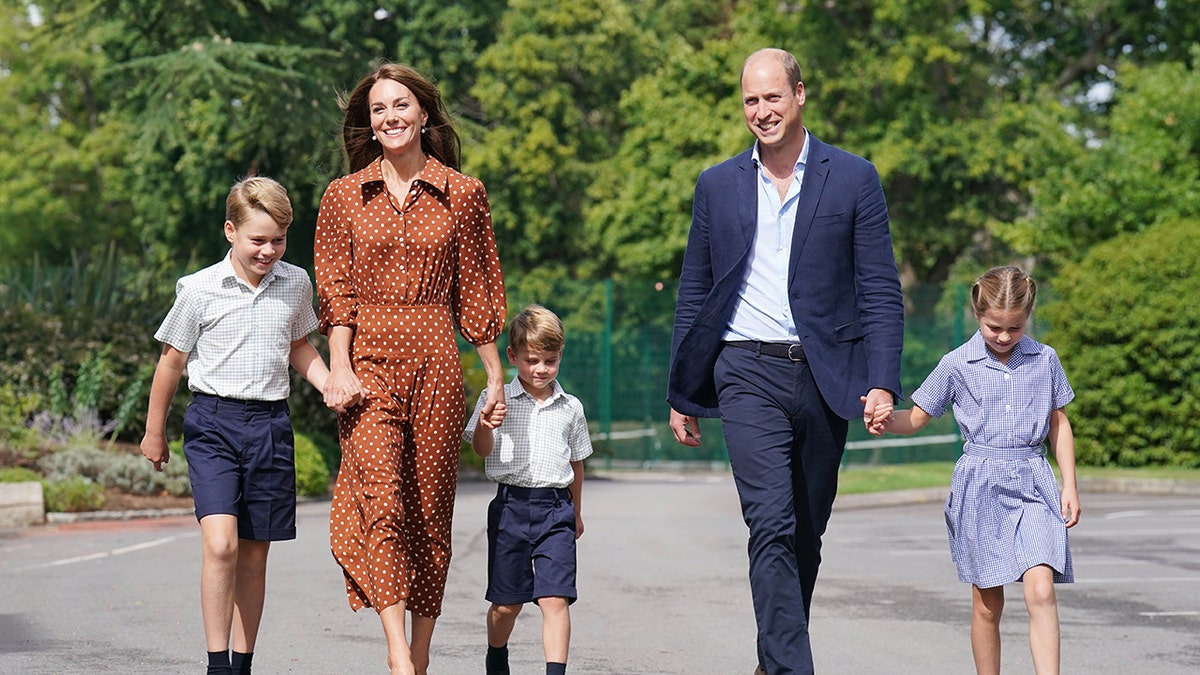 Prince George, Princess Charlotte, and Prince Louis walking with Prince William and Catherine at Lambrook School