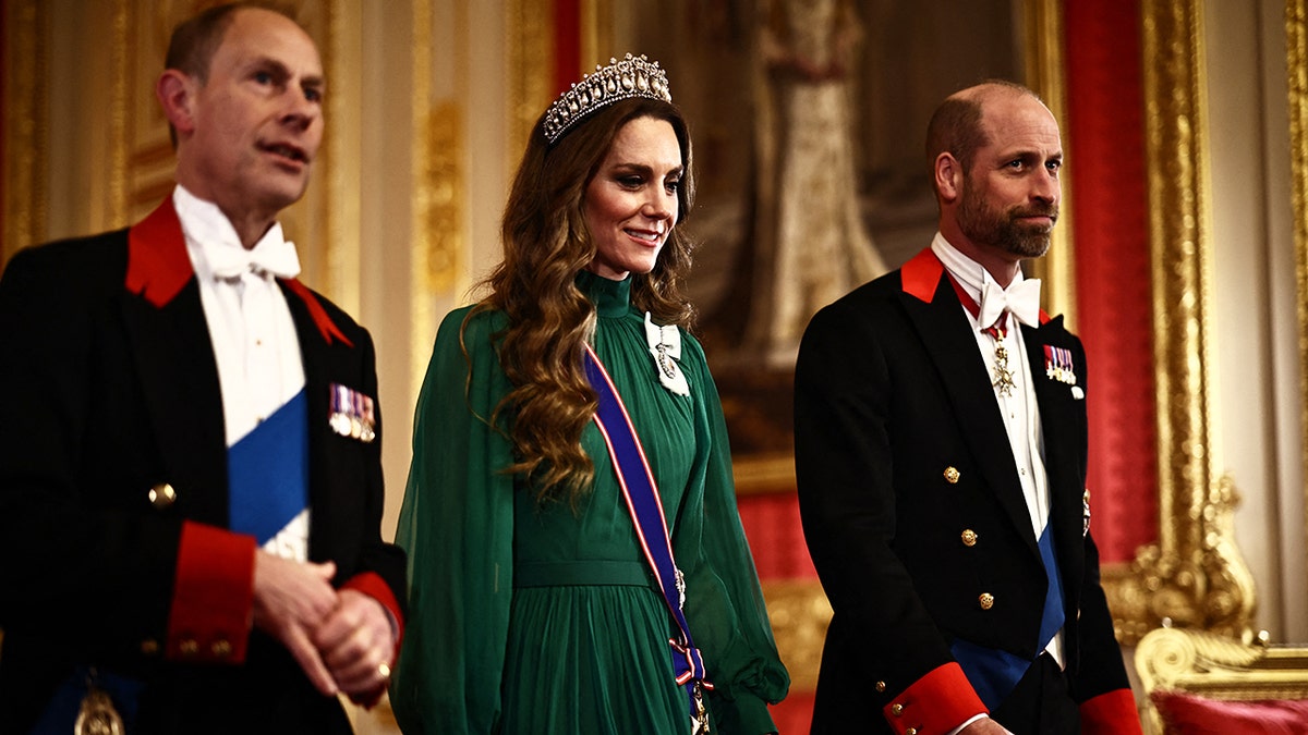 Prince Edward, Duke of Edinburgh, Catherine, Princess of Wales, and Prince William, Prince of Wales, walking together at Windsor Castle
