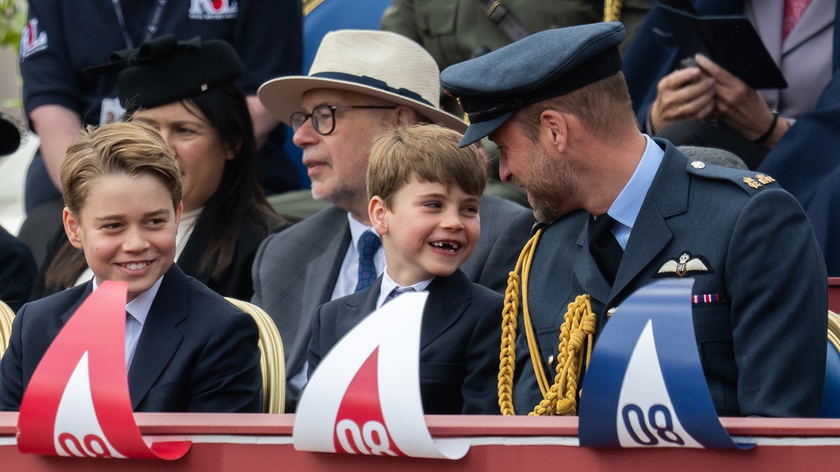 Prince George, Prince William, and Prince Louis during a military procession in London
