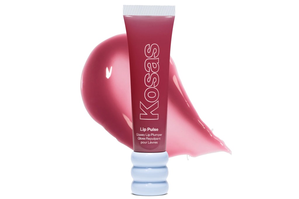 Kosas Lip Pulse Glossy Lip Plumper against a backdrop of a fuchsia pink lip gloss swipe.