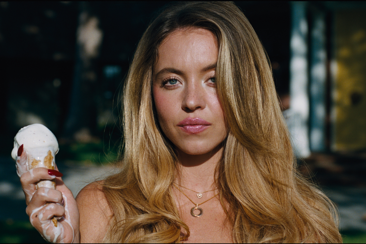 Sydney Sweeney from the series "Euphoria" holding a melting ice cream cone.