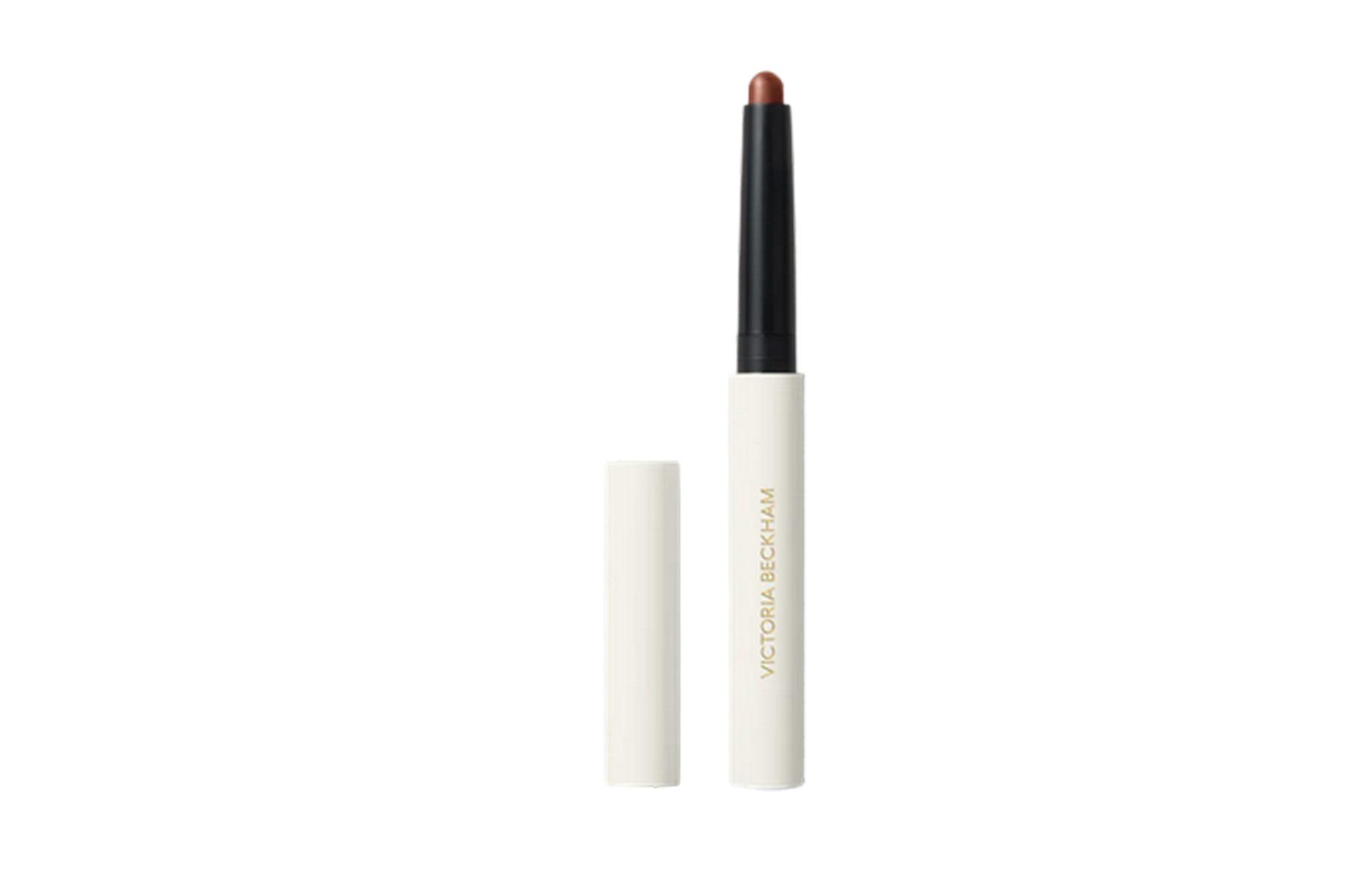 Victoria Beckham lip pencil in a warm brown shade with its white cap removed.