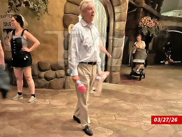 Lindsey Graham boarding disney date swipe