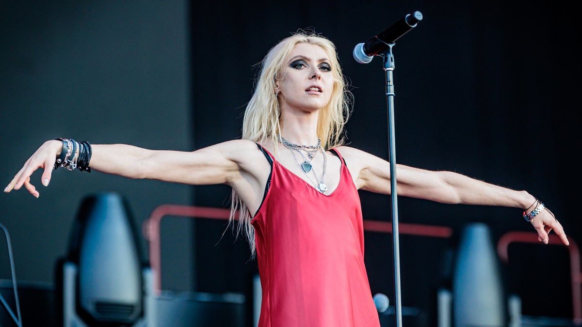 Taylor Momsen performs in a red dress