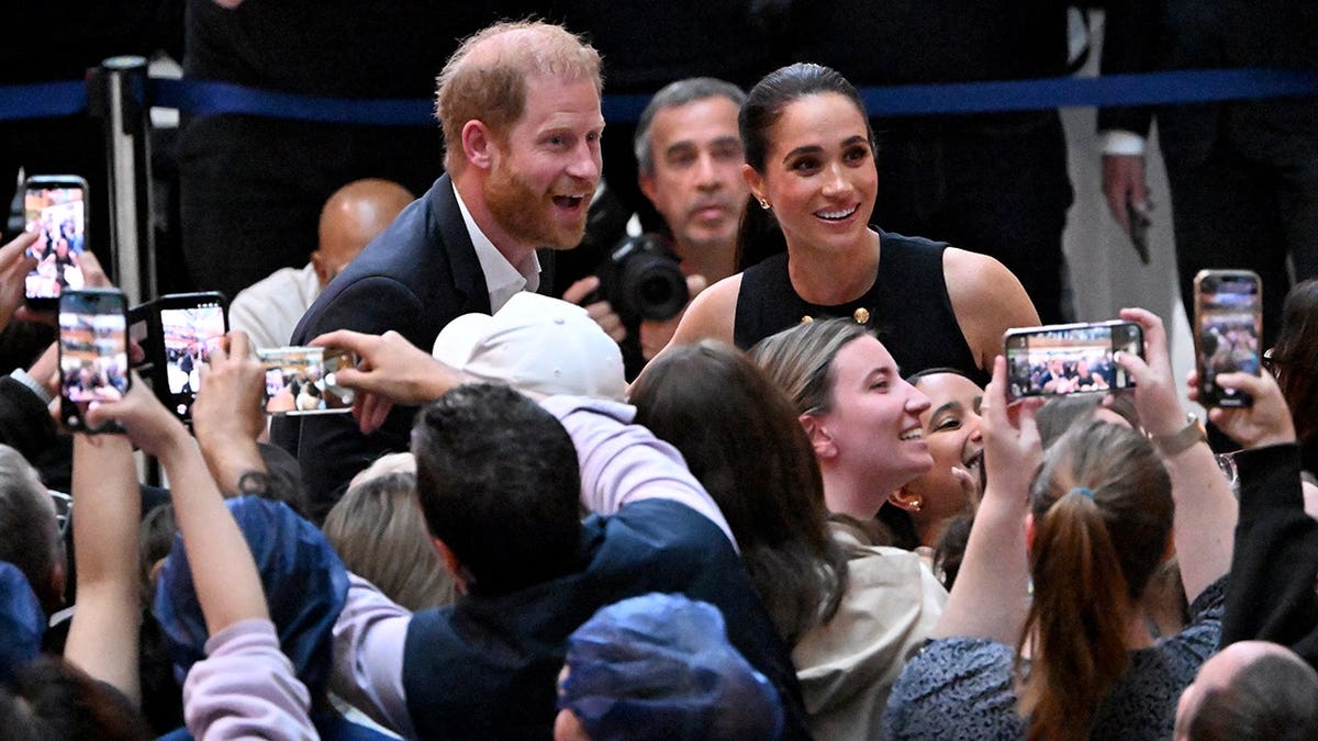 Prince Harry and Meghan meet people at Royal Children's Hospital in Melbourne