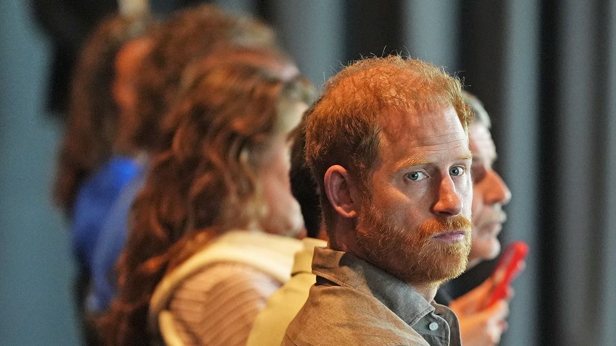 Prince Harry sitting in the audience at Western Bulldogs HQ in Melbourne