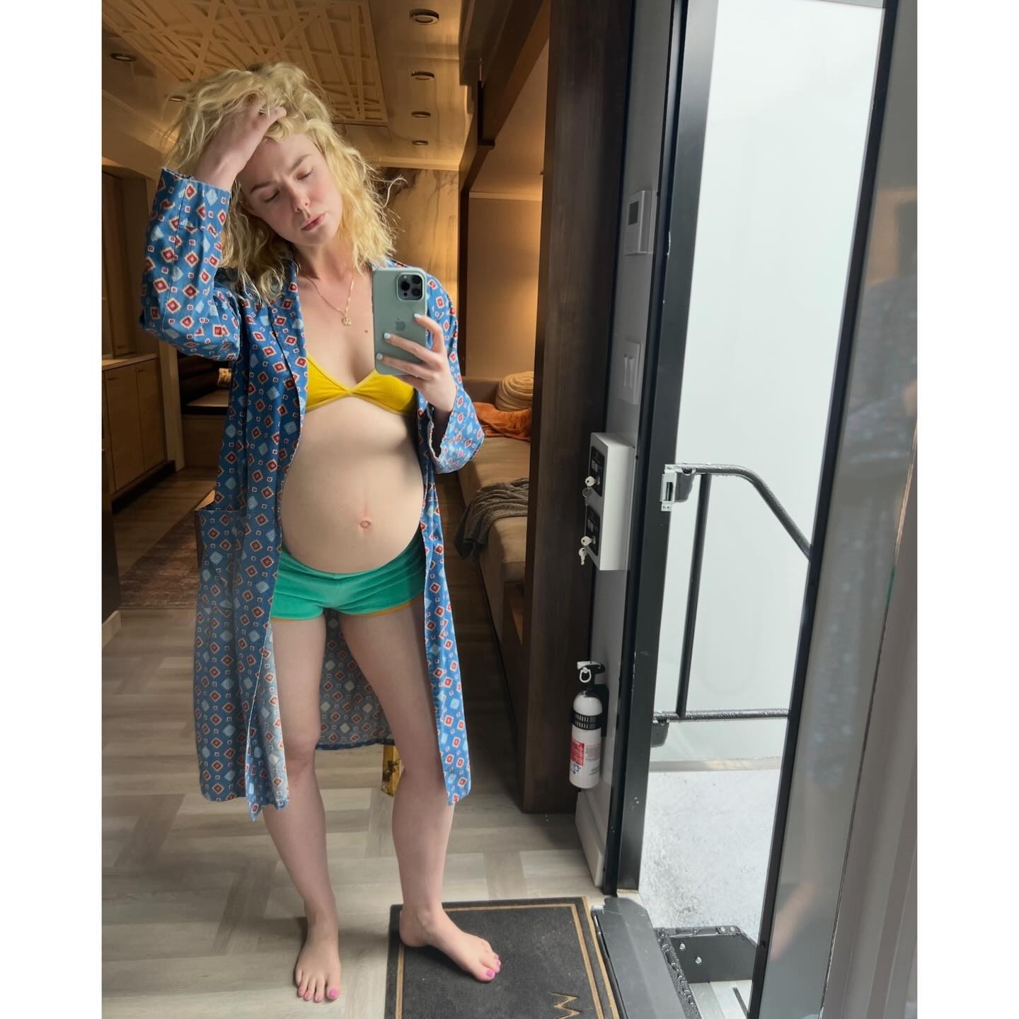 Elle Fanning shows off her baby bump behind the scenes of "Margo's Got Money Troubles".