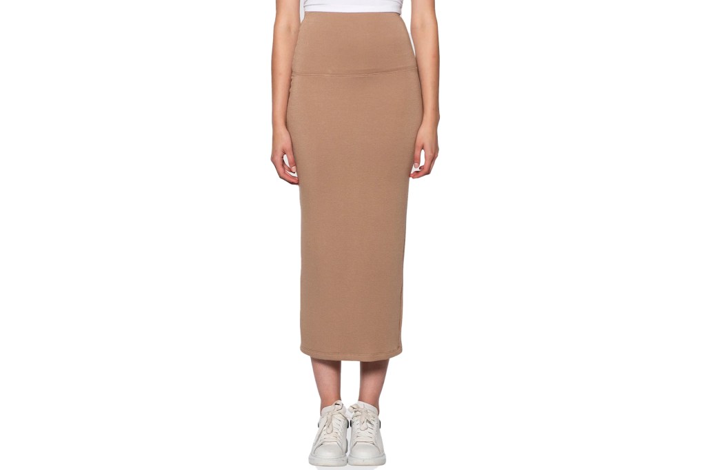 A full-length photo of a tan tube skirt on a model.