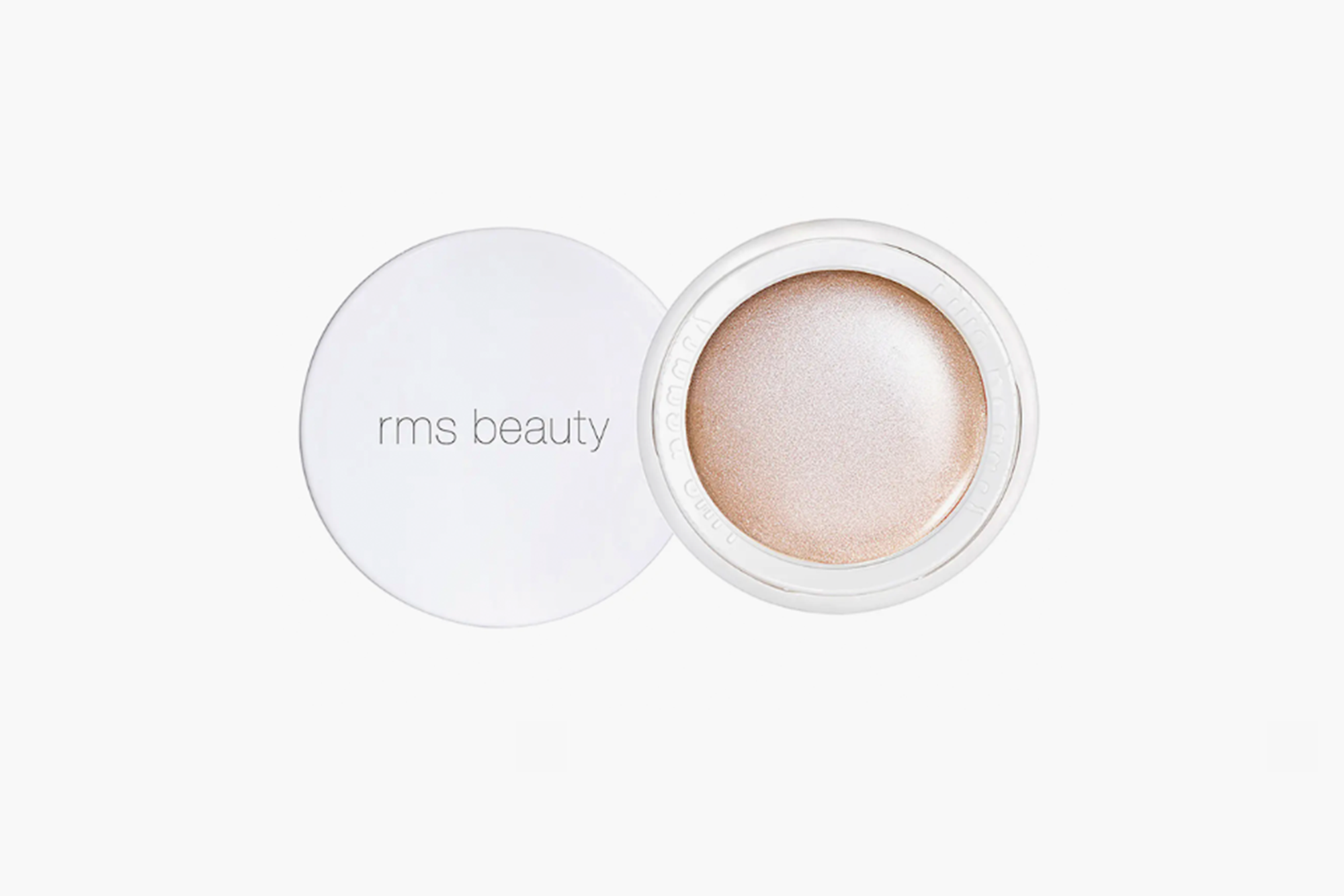 RMS Beauty "Un" Powder in a small white container.