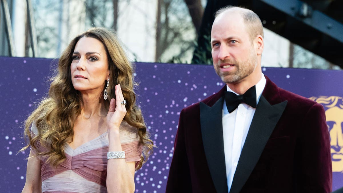 Prince William and Catherine, Princess of Wales, walking together at the BAFTA Film Awards in London