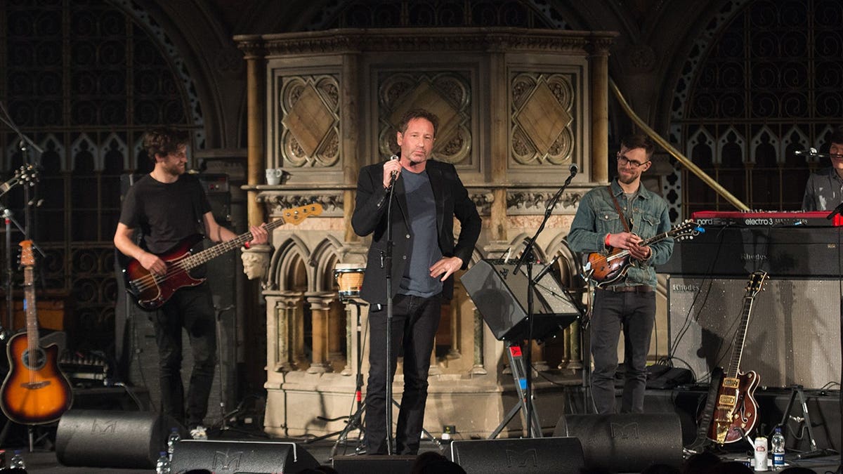 David Duchovny performing on stage at Union Chapel in London