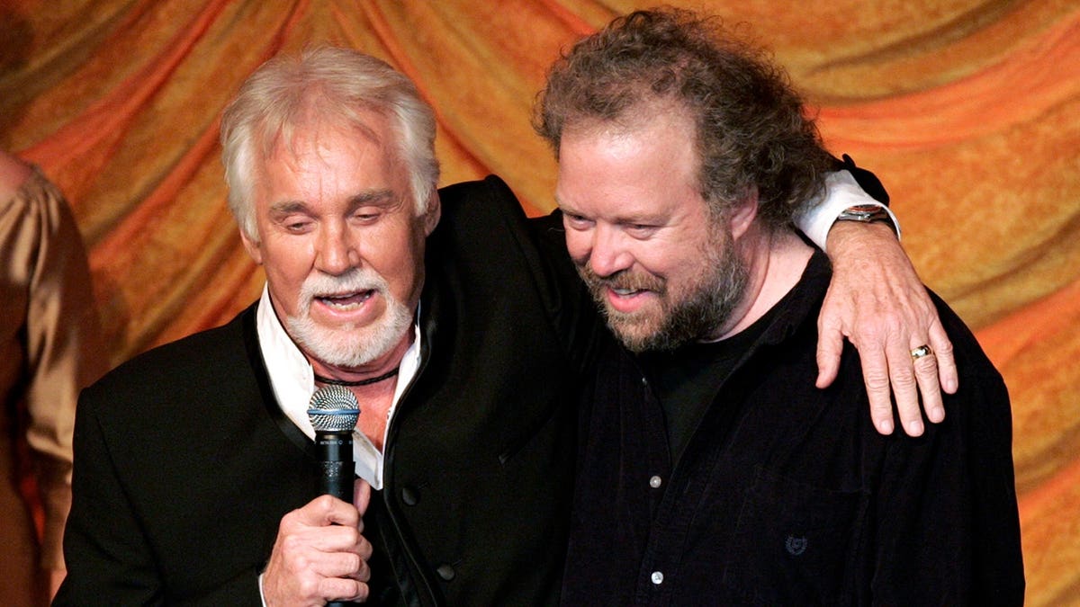 Kenny Rogers presenting ASCAP Creative Achievement Award to Don Schlitz at Nashville event