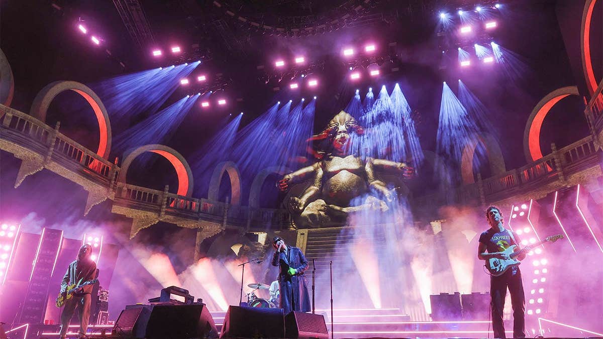 Nick Valensi, Fabrizio Moretti, Julian Casablancas, and Albert Hammond Jr. of The Strokes performing on stage at Coachella